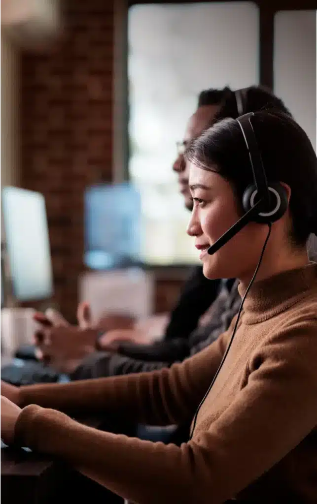 A female employee using headset with mic