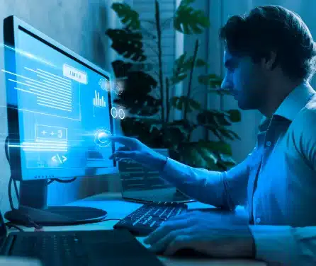 A male developer deploy the data by using his computer desktop