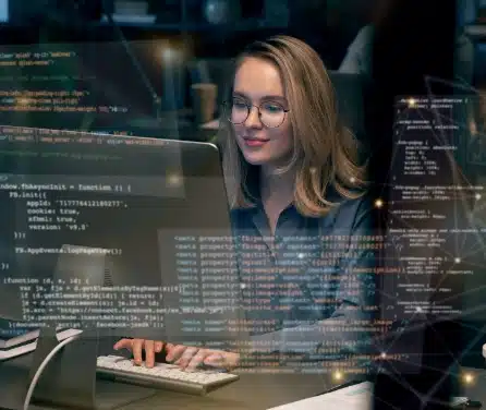 A female developer coding on her desktop