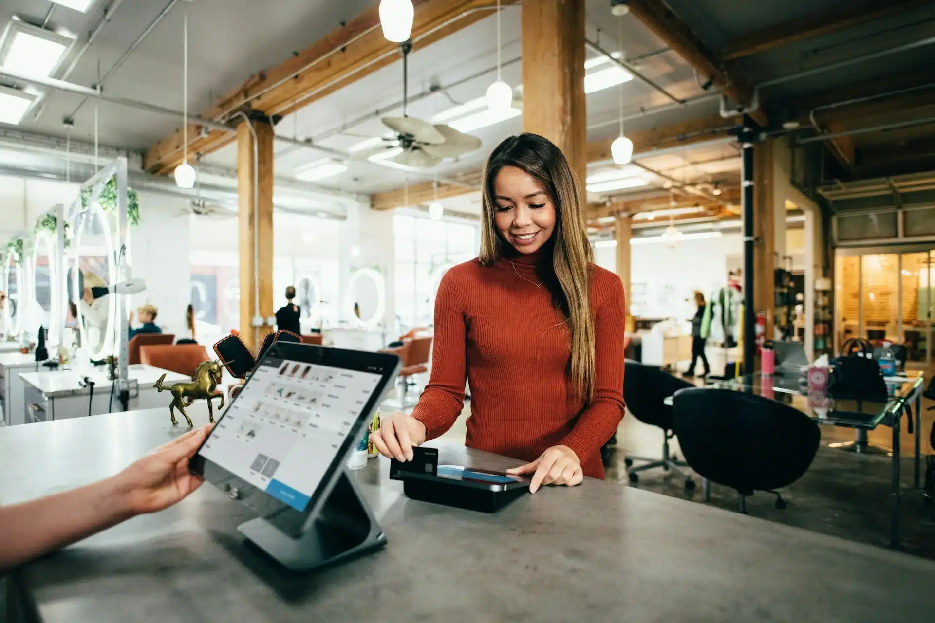 A female paying for her purchases